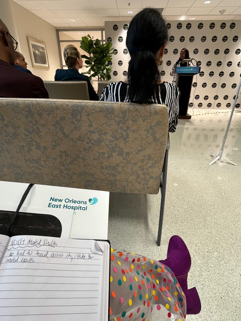 Megan Braden-Perry of The New Orleans East Sunshine Weekly attending an event at New Orleans East Hospital